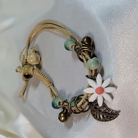 Hand-knotted Hemp Bracelet, ceramic beads, flower; charm, choice of color - Picture 6 of 6